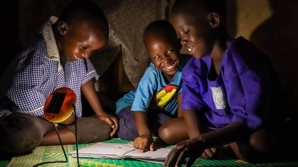 African students with donated solar light